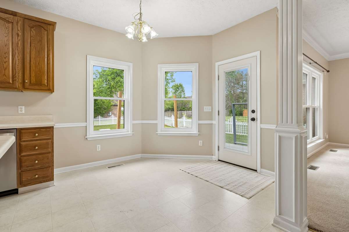 Here's an area for a table so you can enjoy the views in the back yard as you're eating breakfast! The exterior door leads to the back yard.