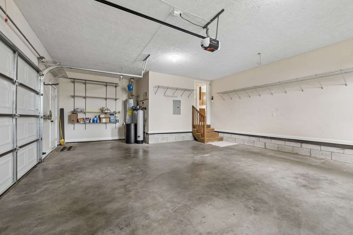 The salt water softener located toward the back. Entrance to the home and plenty of storage ability in this garage!