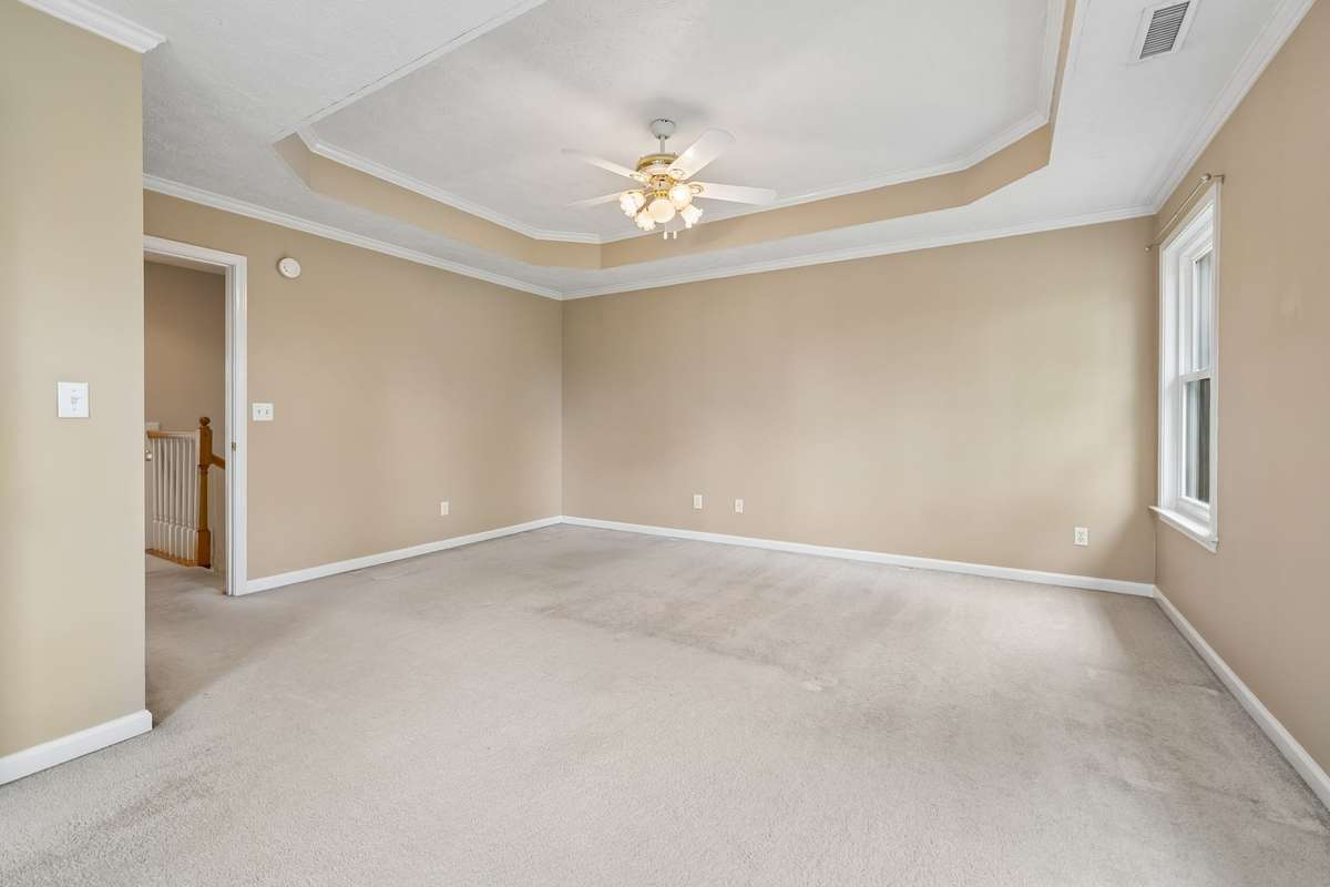 On the second level, is the Primary Bedroom which has a trey-ceiling. This is a nice size Bedroom!