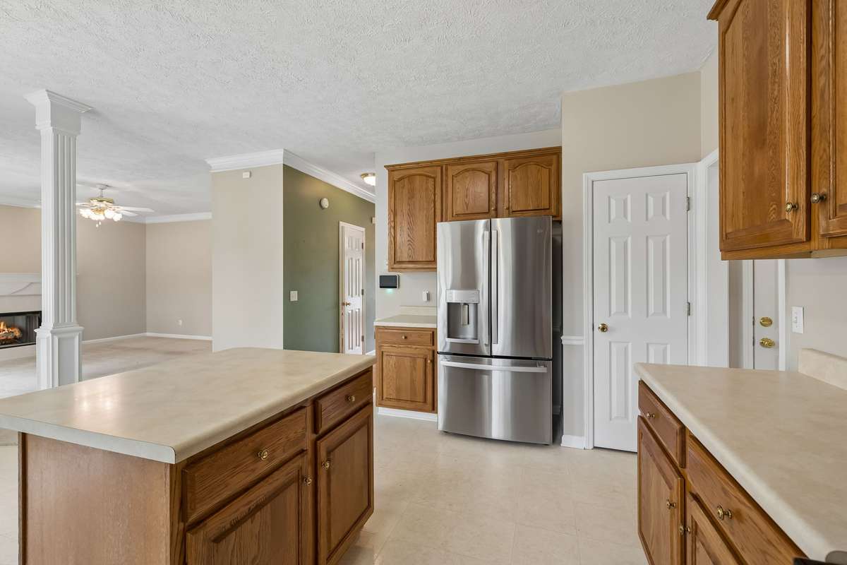 The pantry is located next to the Refrigerator.