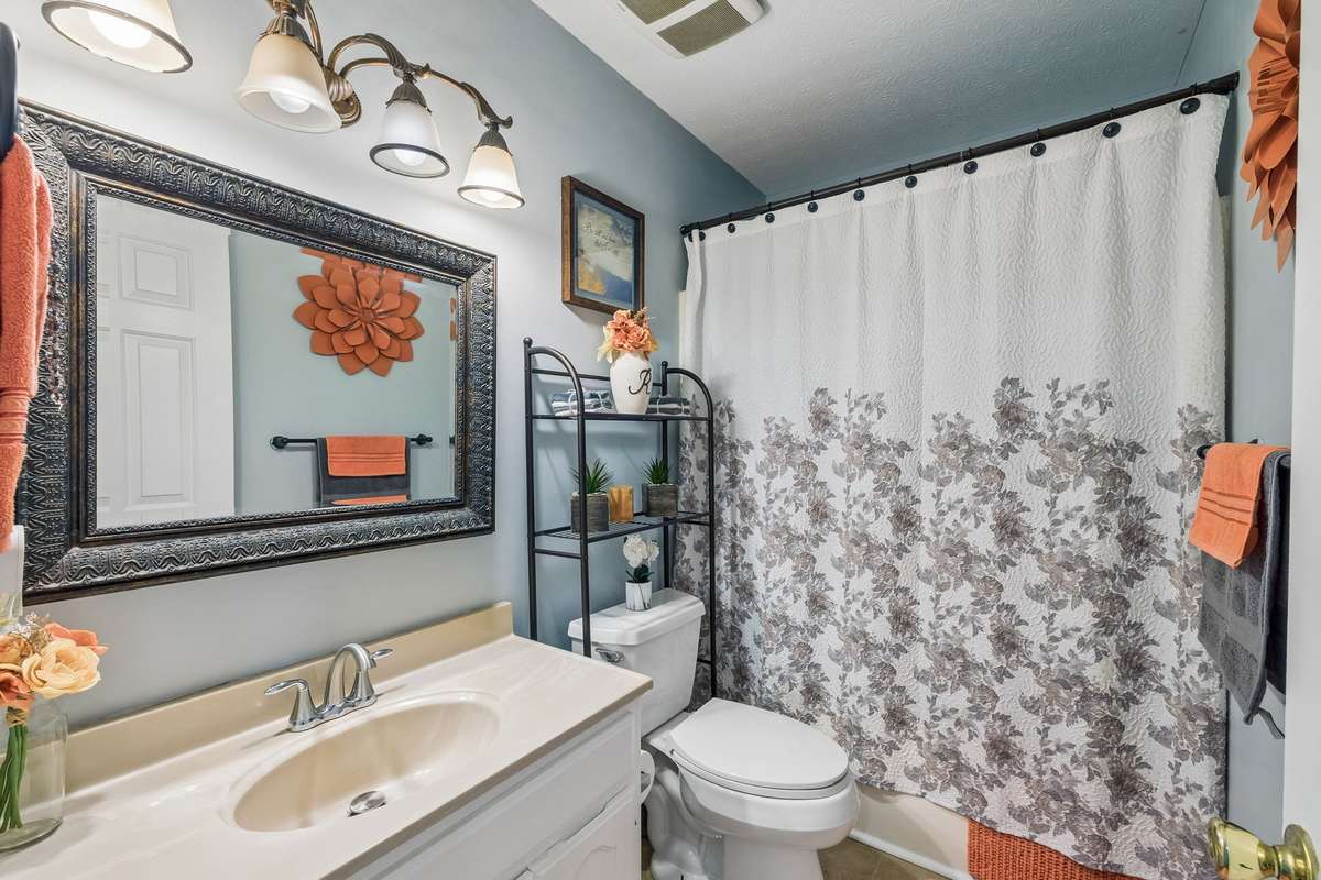 The 2 secondary bedrooms share this bathroom