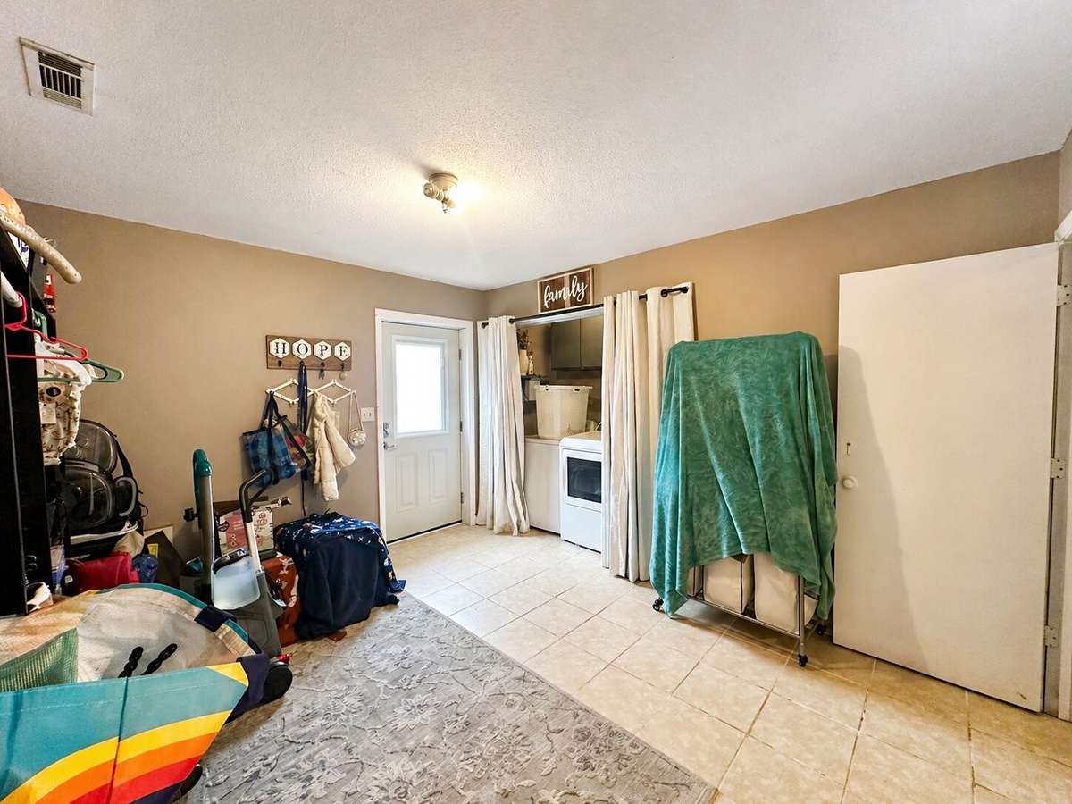 Laundry connection to the right of egress.