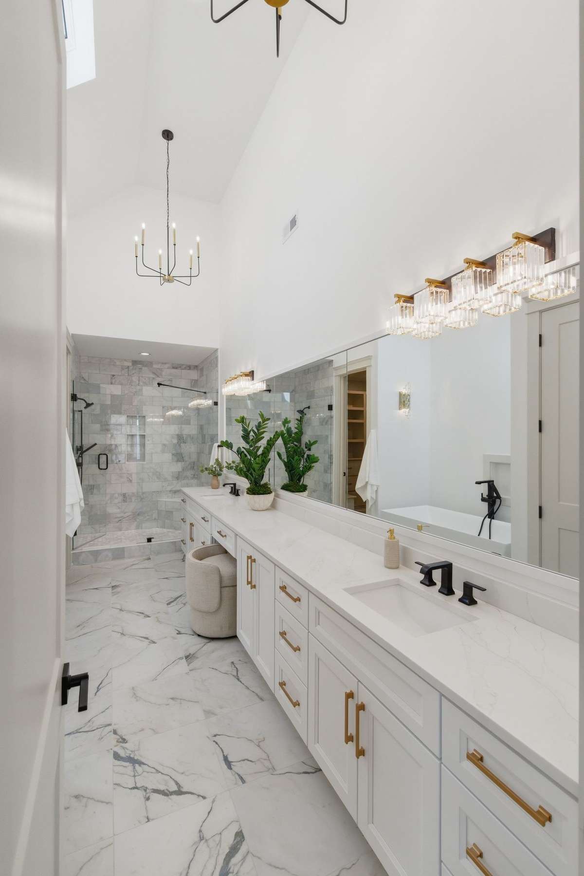 Primary bathroom upstairs with marble shower