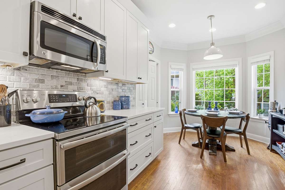 New tile backsplash, new cabinets + hardware