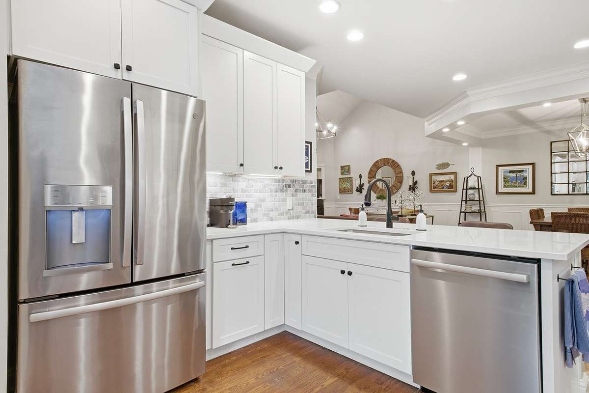 Stainless steel appliances, quartz countertops, breakfast bar