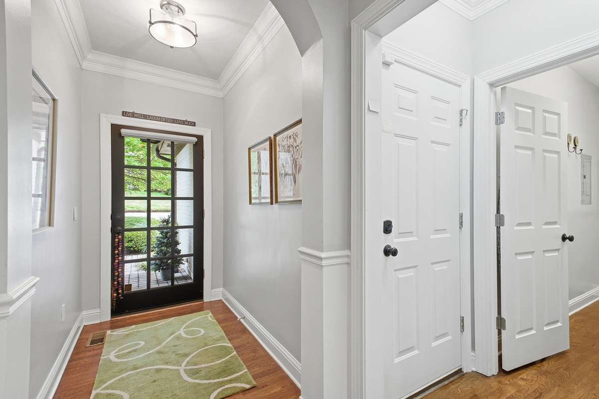 High ceilings with crown molding throughout