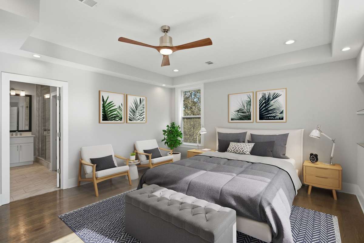 Primary Suite. Photo enhanced with virtual staging. No furniture or décor is physically present.