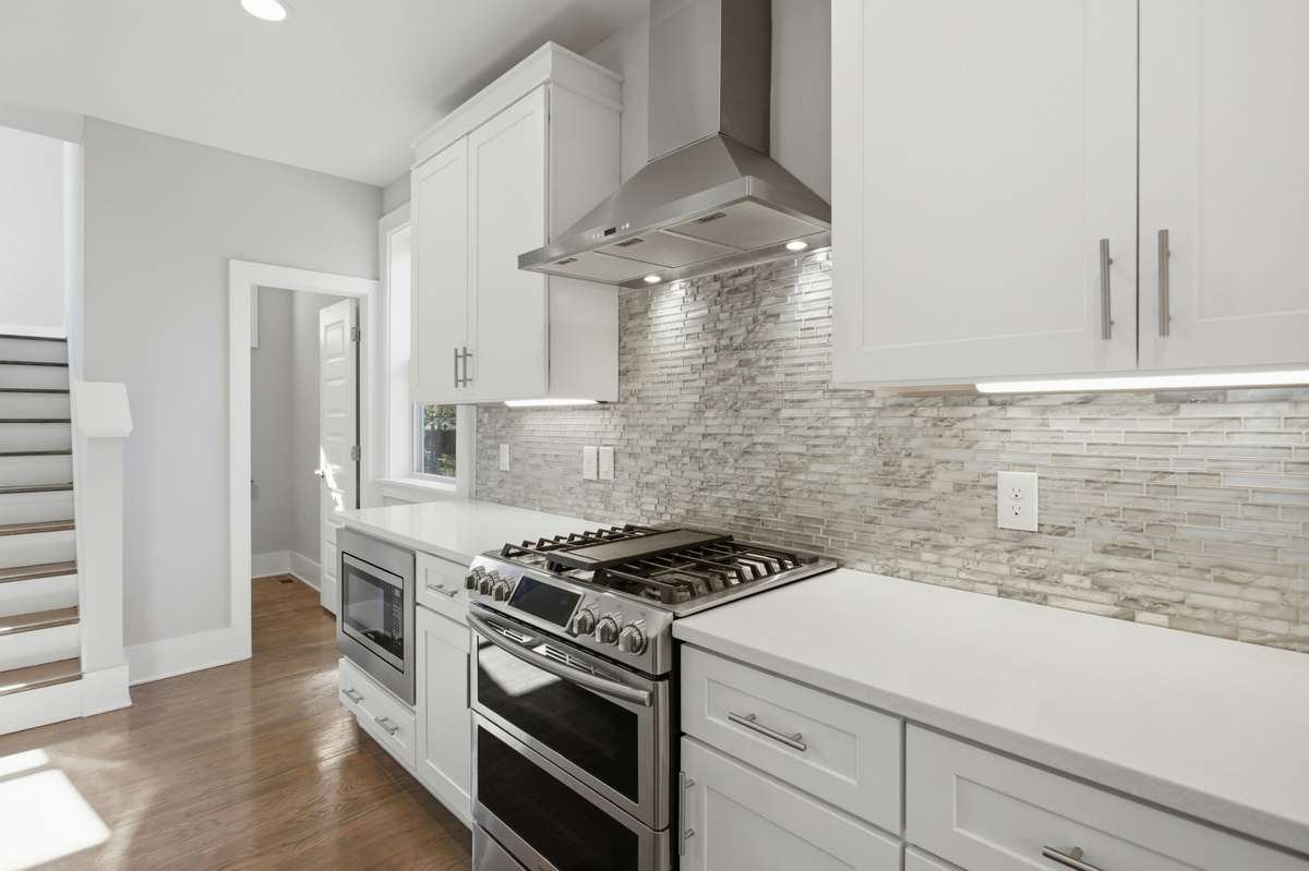 Chef-inspired kitchen featuring a gas range and oven, ideal for everyday cooking and entertaining alike