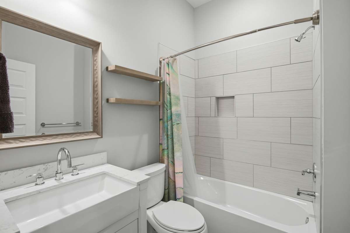 Main level - bedroom one en-suite.