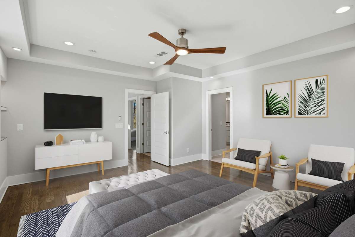 Primary Suite. Photo enhanced with virtual staging. No furniture or décor is physically present.