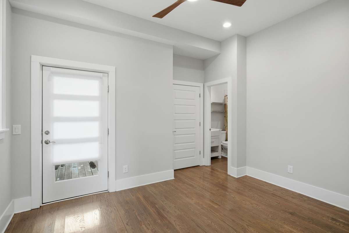 Bedroom one is on the lowest level, includes a private bath and private entrance, ideal for guests, in-laws, or a home office setup
