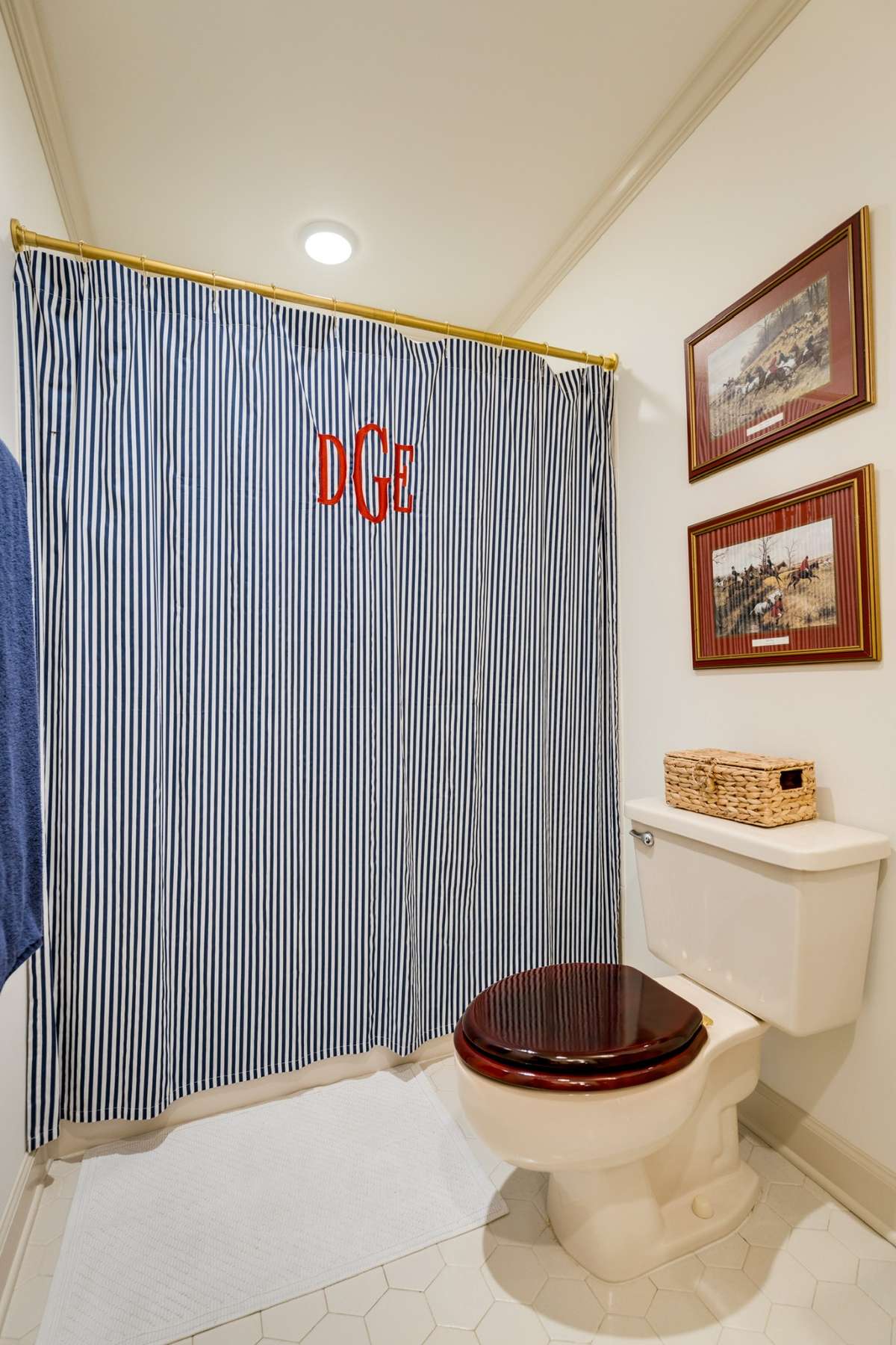 Tiled shower tub combo + accented crown molding.