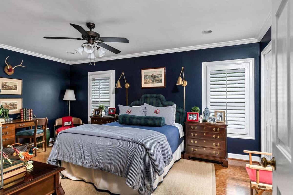 Primary Bedroom is oversized with room for a home office AND Peloton station!