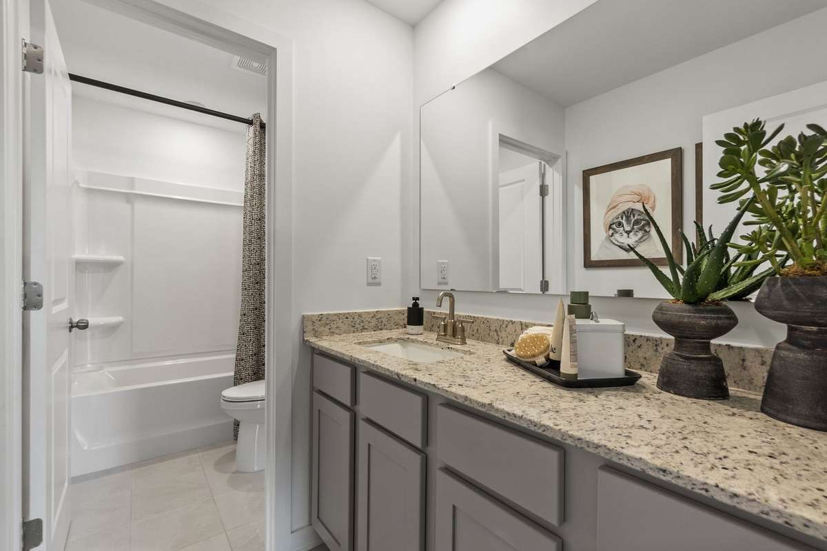 Upstairs Secondary Bathroom
(furnished model home photo)