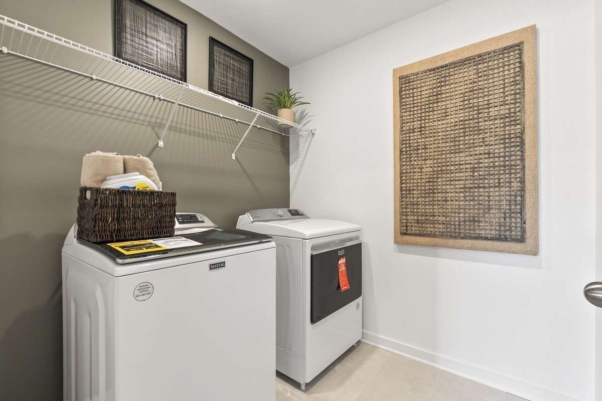Upstairs Laundry Room
(furnished model home photo)