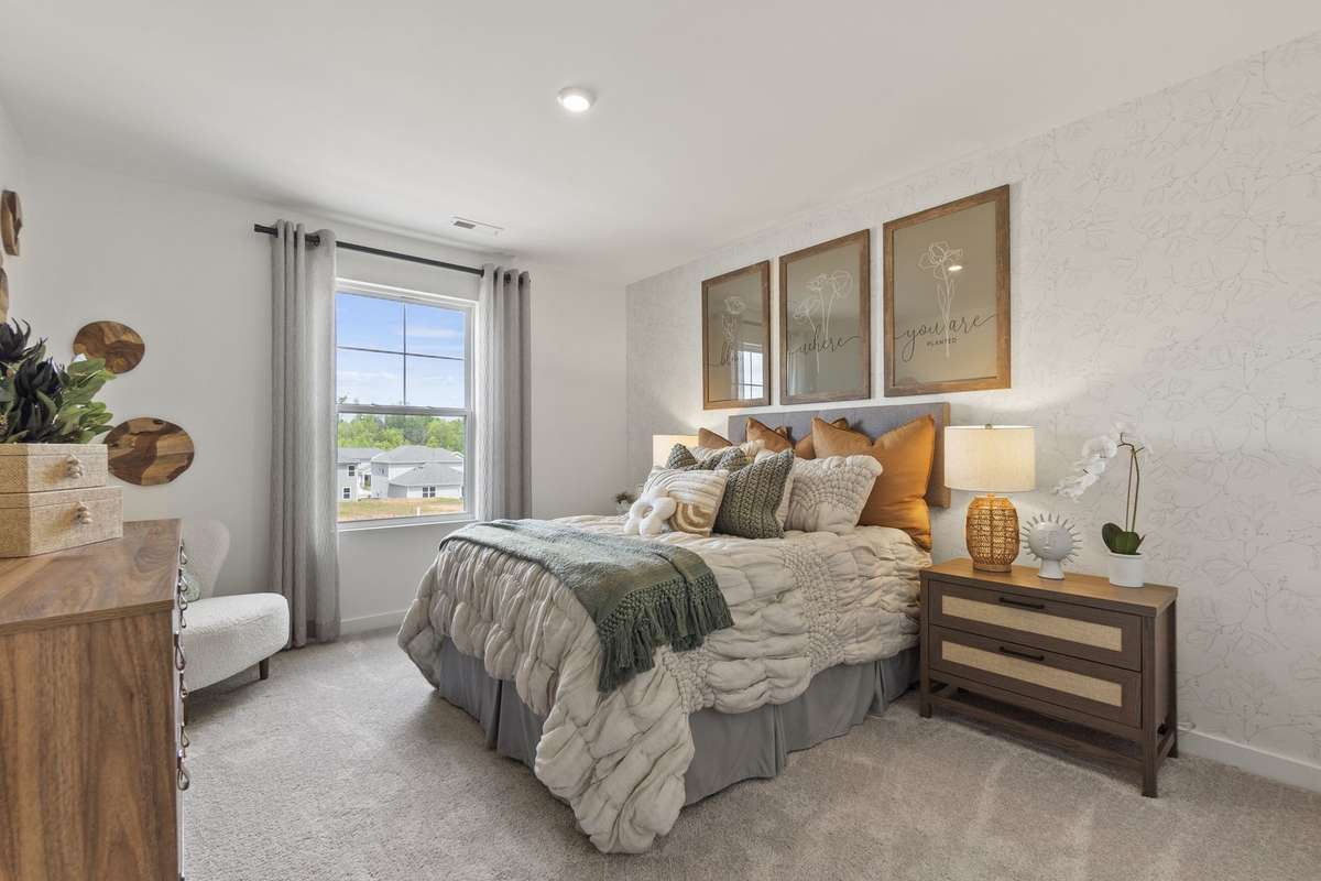 Upstairs Secondary Bedroom
(furnished model home photo)