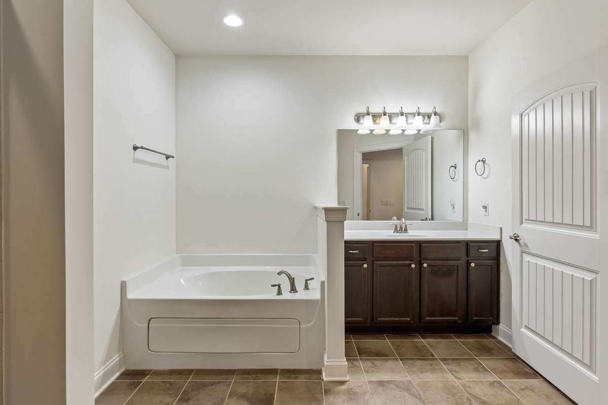 Tiled bath includes a spacious vanity and walk in closet! 217 Whiteamore Run, Murfreesboro, TN 37128