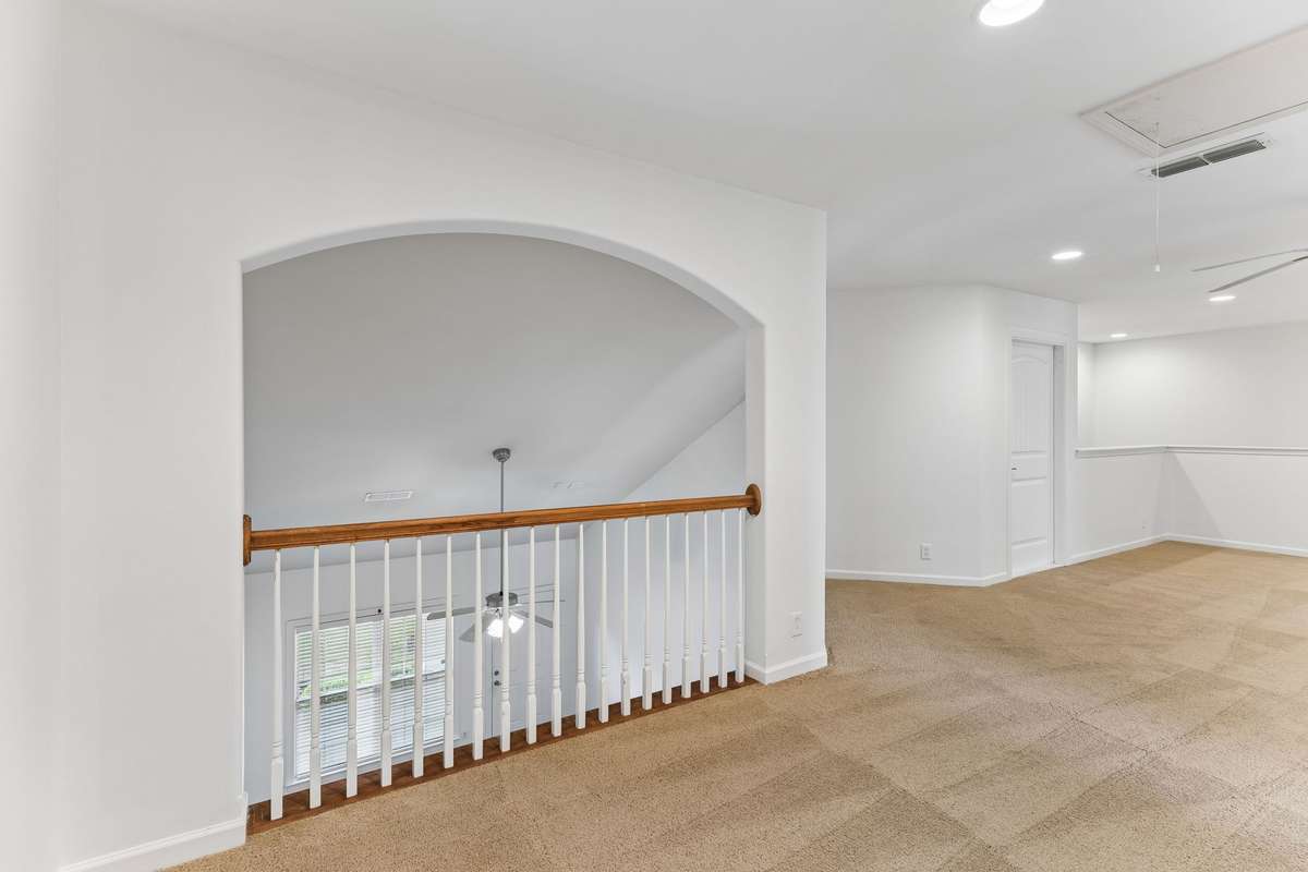 Arched openings found throughout provide subtle character to the spaces! 217 Whiteamore Run, Murfreesboro, TN 37128