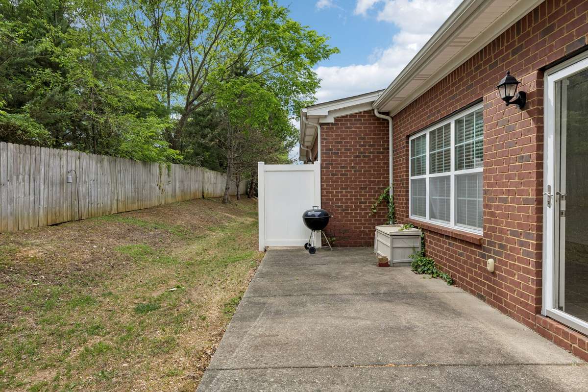Private patio and a lush tree line to give you a serene backdrop! 217 Whiteamore Run, Murfreesboro, TN 37128