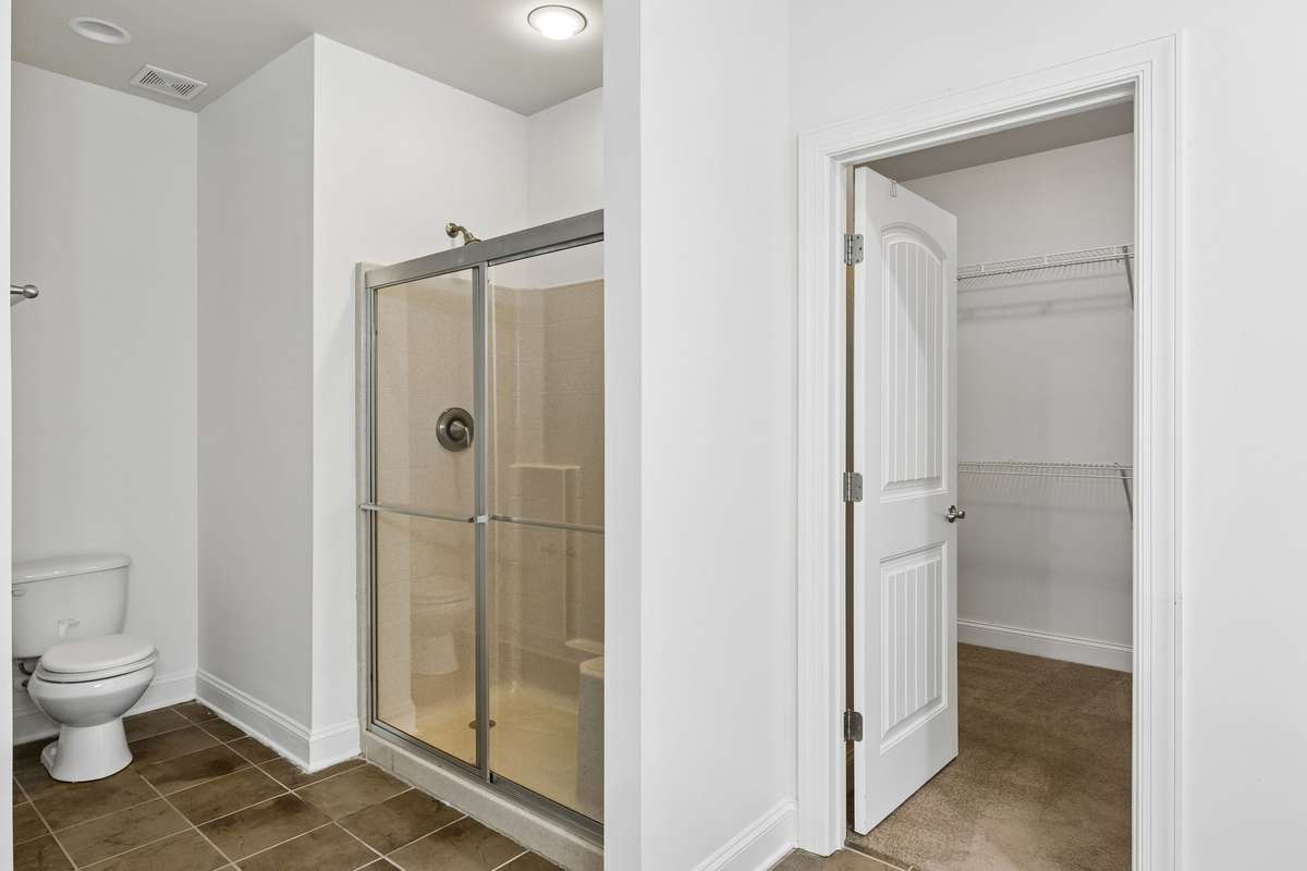 Primary bath has a roomy shower and separate soaking tub! 217 Whiteamore Run, Murfreesboro, TN 37128