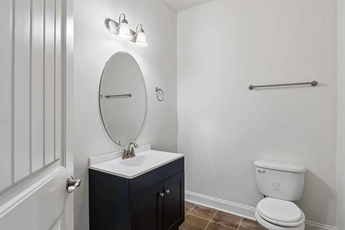 Powder bath downstairs features tiled floor and is freshly painted! 217 Whiteamore Run, Murfreesboro, TN 37128