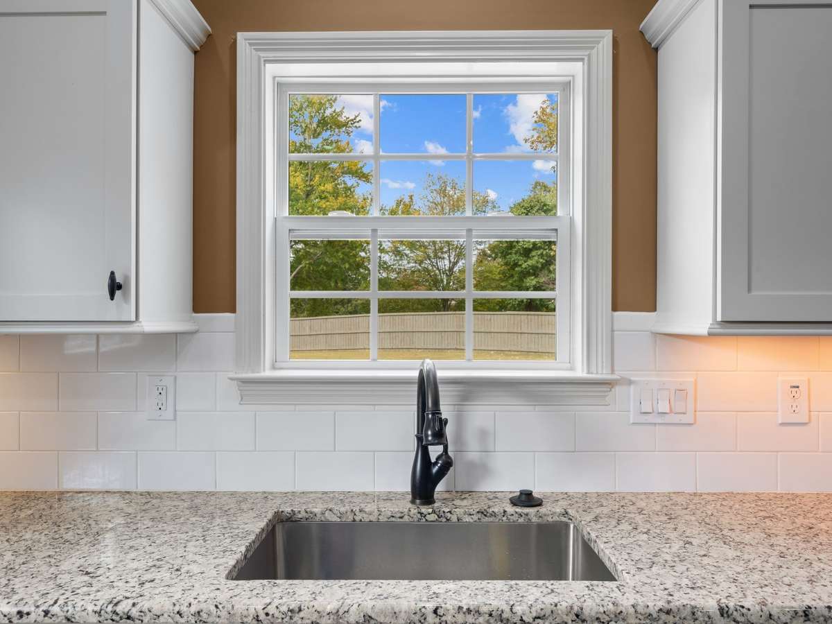 Great view of the backyard from the kitchen sink