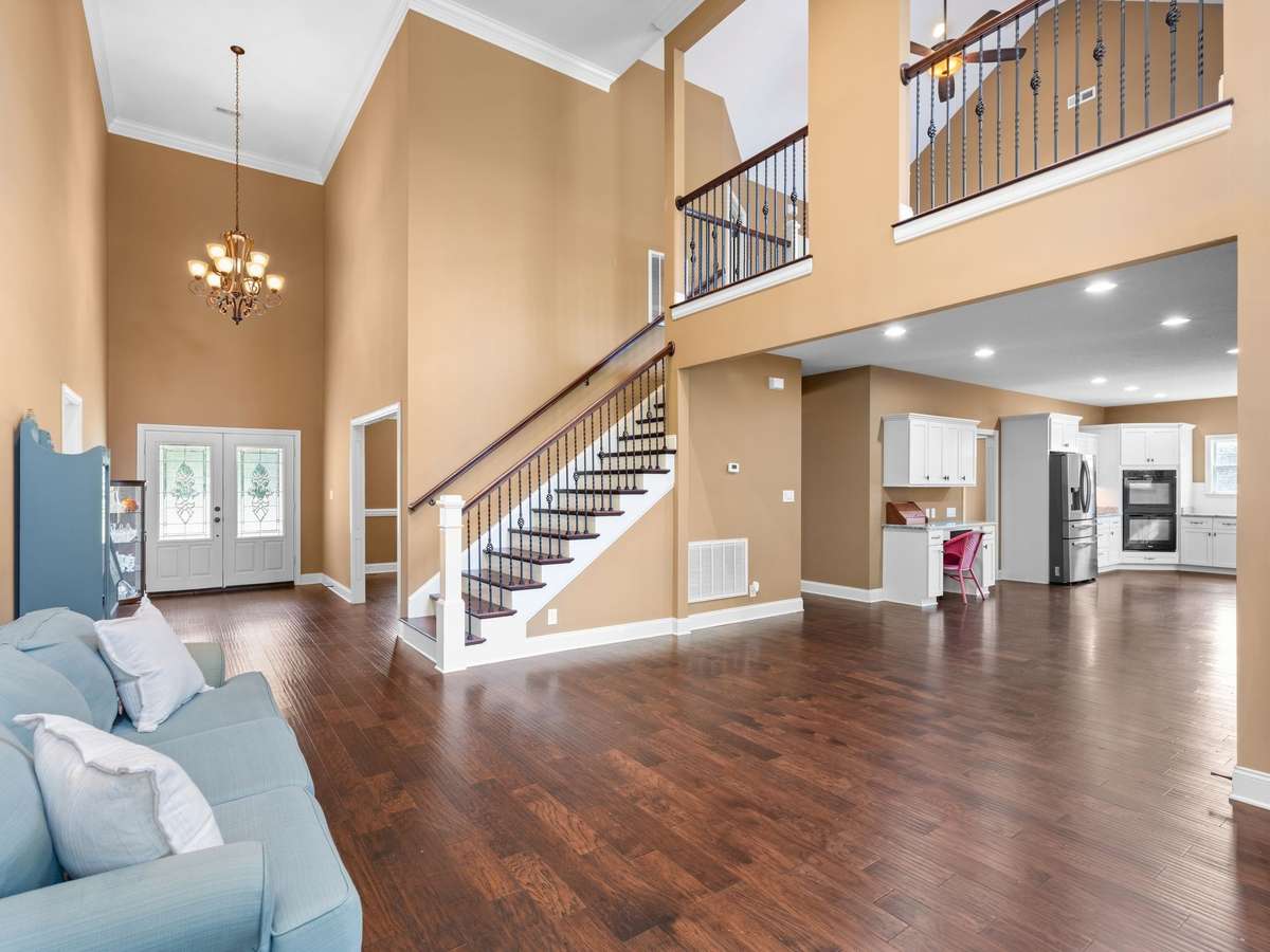 Open-concept layout connecting kitchen, dining, and living—ideal for entertaining.