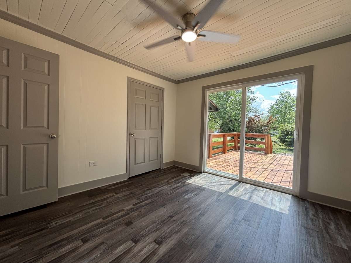 Primary Bedroom with Double Closets and access to Deck