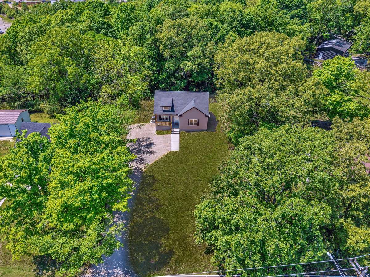 Park-Like + Level Lot that is Conveniently "Tucked Away" yet 2 Minutes to Hwy. 46 Corridor
Note: Green Grass Edits on all Exterior Photos
