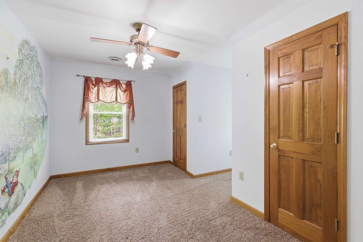upstairs bedroom with plenty of storage
