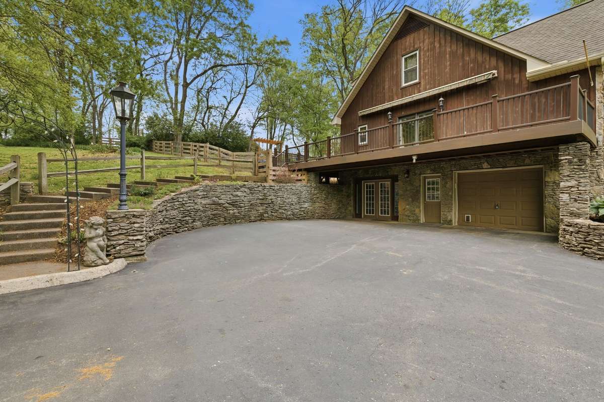 basement mother-in-law/teen suite with parking right at the door and a garage to pull your car into