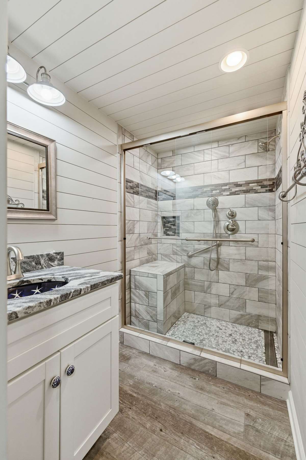 pristine basement bathroom, gorgeous tile shower, granite and custom sink