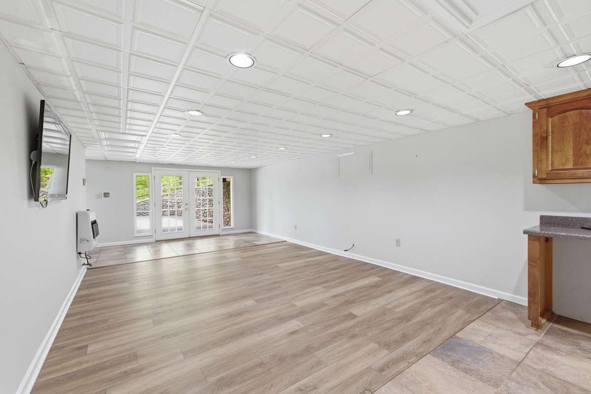 parking right outside the basement level doors, brand new flooring, gas wall heater
