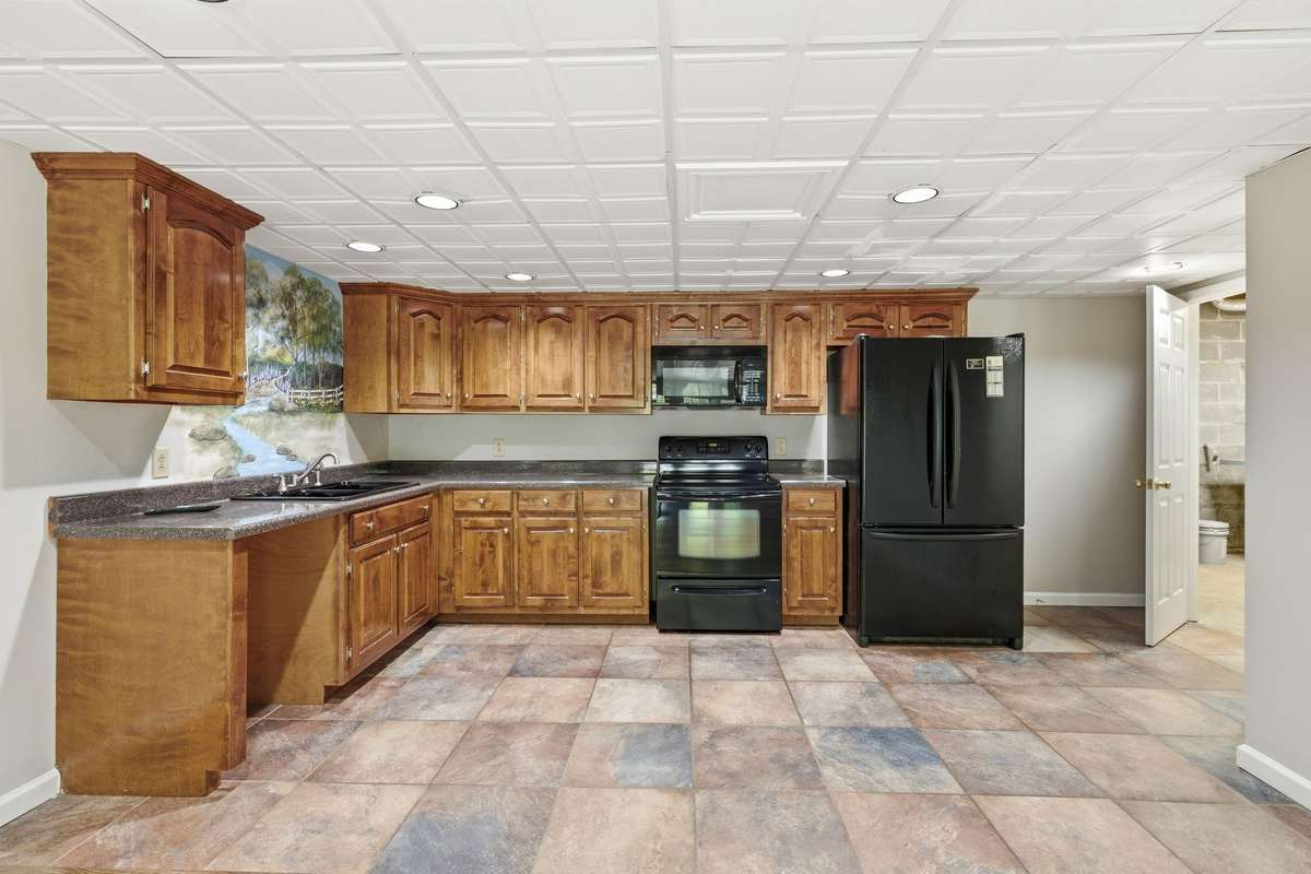 second kitchen, all appliances stay. Storage through the door to the right