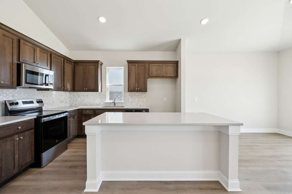 **Photos are of the same floor plan (Bledsoe) by the same builder (Ashton Woods) in the same neighborhood (Cades Bluff), but are not of the actual house, as the subject property will have a different interior design collection**