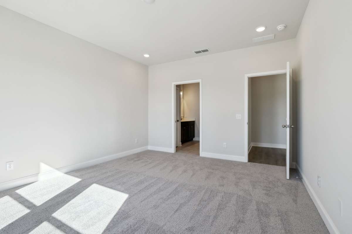 **Photos are of the same floor plan (Bledsoe) by the same builder (Ashton Woods) in the same neighborhood (Cades Bluff), but are not of the actual house, as the subject property will have a different interior design collection**