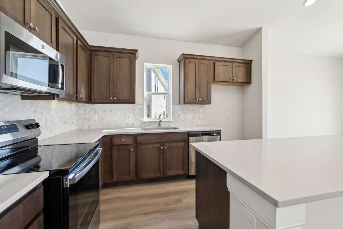 **Photos are of the same floor plan (Bledsoe) by the same builder (Ashton Woods) in the same neighborhood (Cades Bluff), but are not of the actual house, as the subject property will have a different interior design collection**