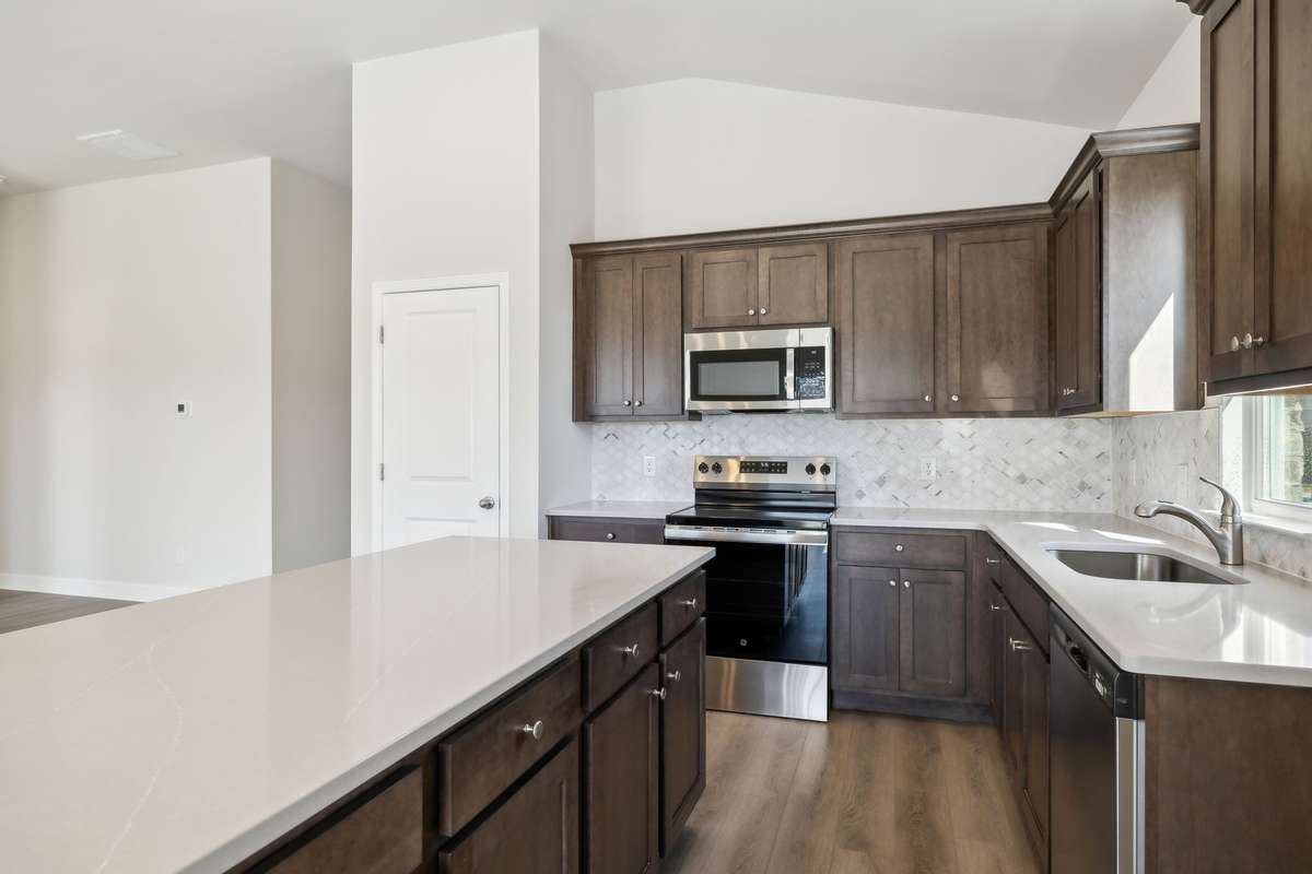 **Photos are of the same floor plan (Bledsoe) by the same builder (Ashton Woods) in the same neighborhood (Cades Bluff), but are not of the actual house, as the subject property will have a different interior design collection**