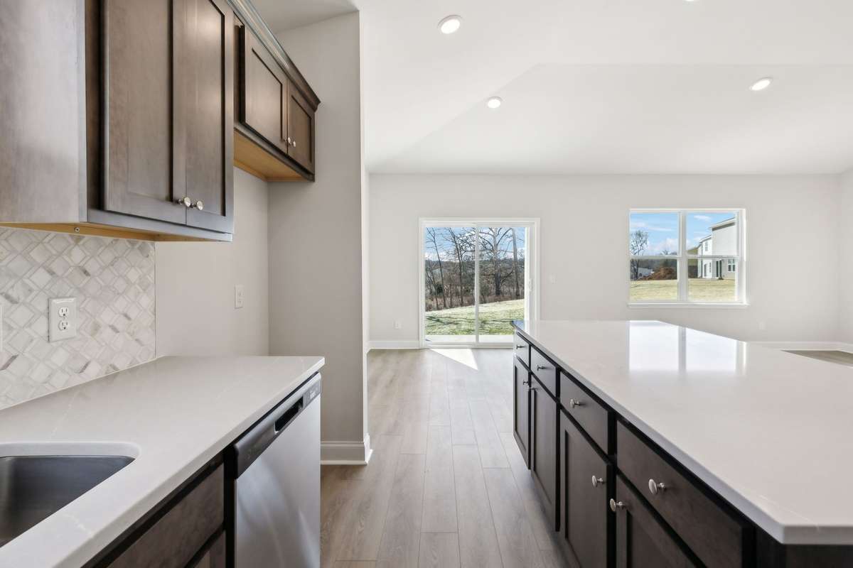 **Photos are of the same floor plan (Bledsoe) by the same builder (Ashton Woods) in the same neighborhood (Cades Bluff), but are not of the actual house, as the subject property will have a different interior design collection**