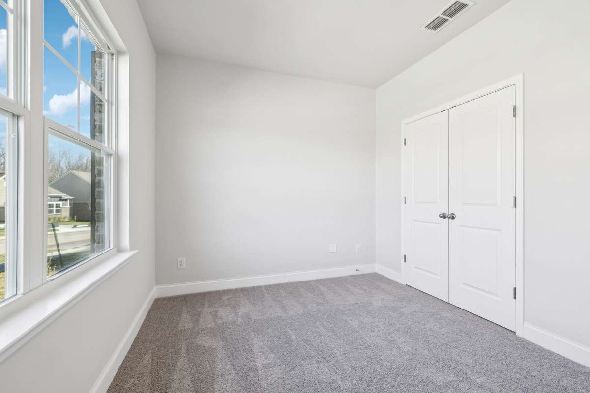 **Photos are of the same floor plan (Bledsoe) by the same builder (Ashton Woods) in the same neighborhood (Cades Bluff), but are not of the actual house, as the subject property will have a different interior design collection**