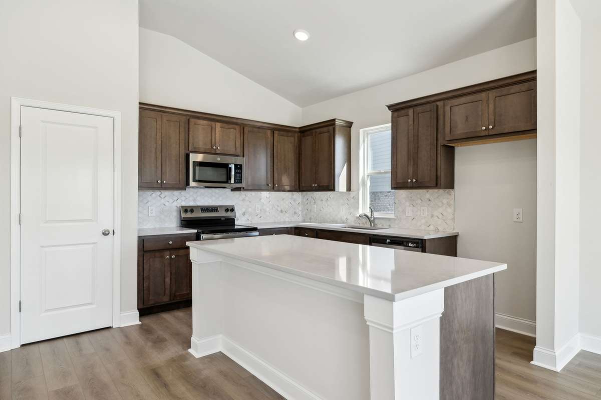 **Photos are of the same floor plan (Bledsoe) by the same builder (Ashton Woods) in the same neighborhood (Cades Bluff), but are not of the actual house, as the subject property will have a different interior design collection**