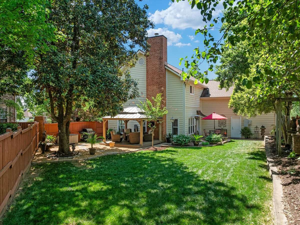 Here’s the real reason you’ll come see this home… the backyard. Fully fenced, backing to a quiet cul-de-sac, with a built-in fountain and a new pergola with lighting—basically your own private oasis for unwinding (wine optional, but highly encouraged