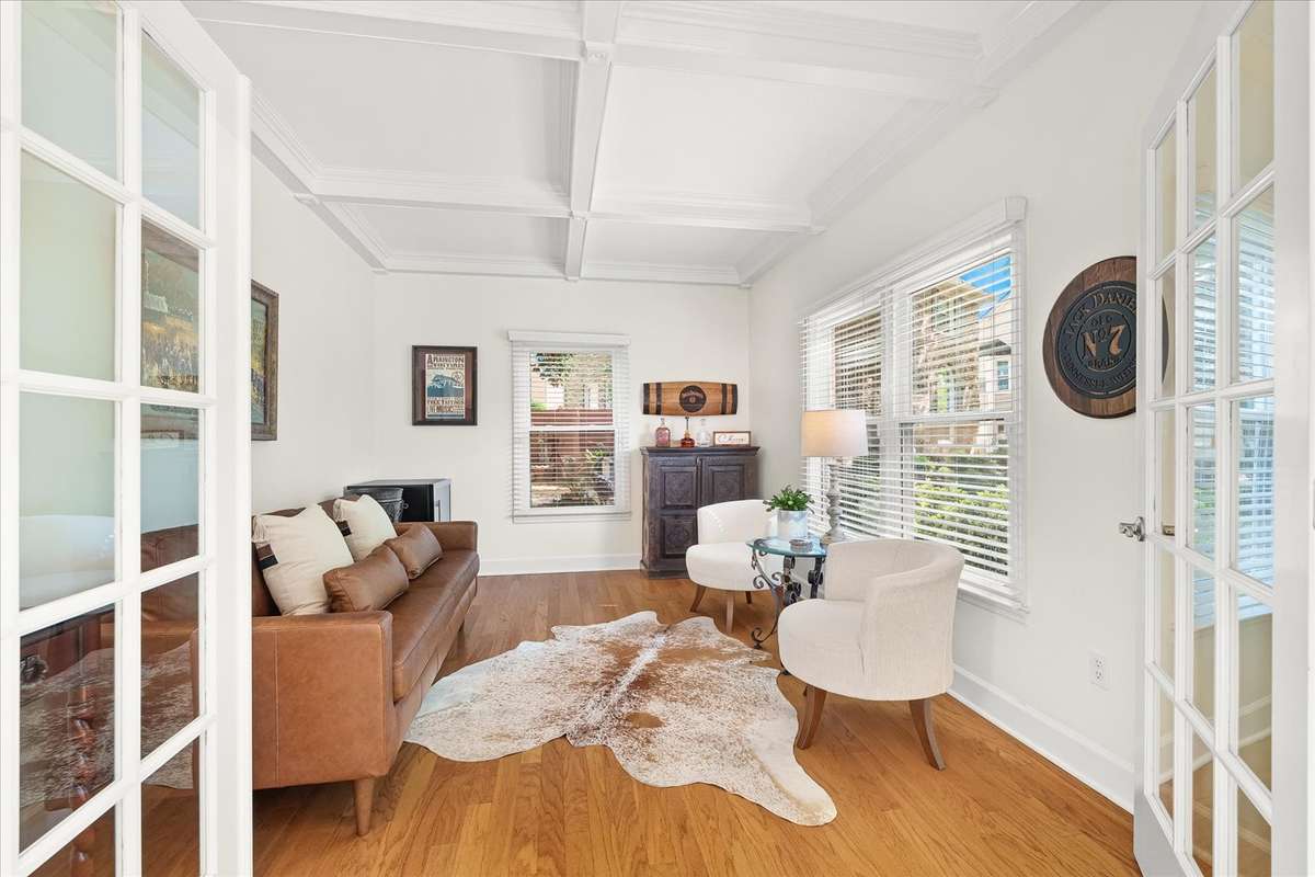 Bourbon and wine parlor… or office—your call. Either way, it’s going to look good doing it, thanks to the coffered ceiling and French doors that add just the right amount of style and separation.