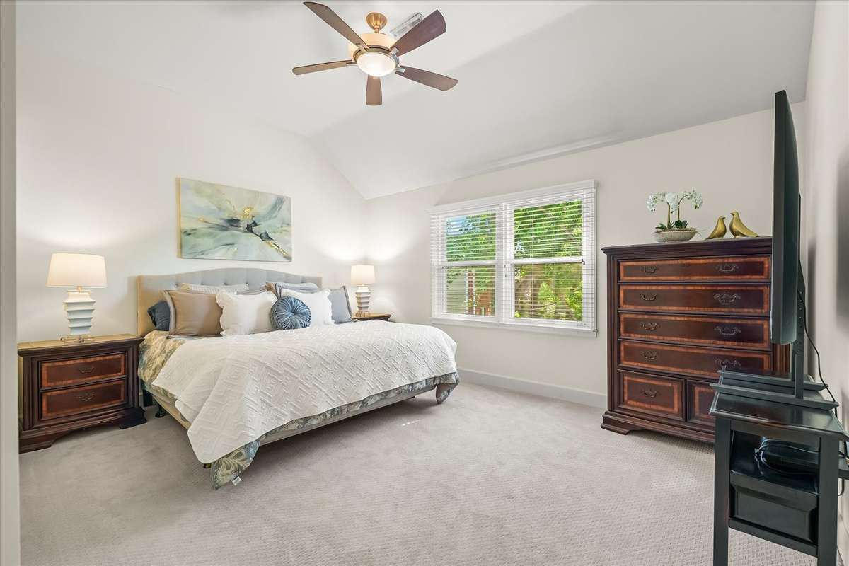 Vaulted ceilings elevate this lovely space—bringing in light, volume, and that open, airy feel everyone wants.