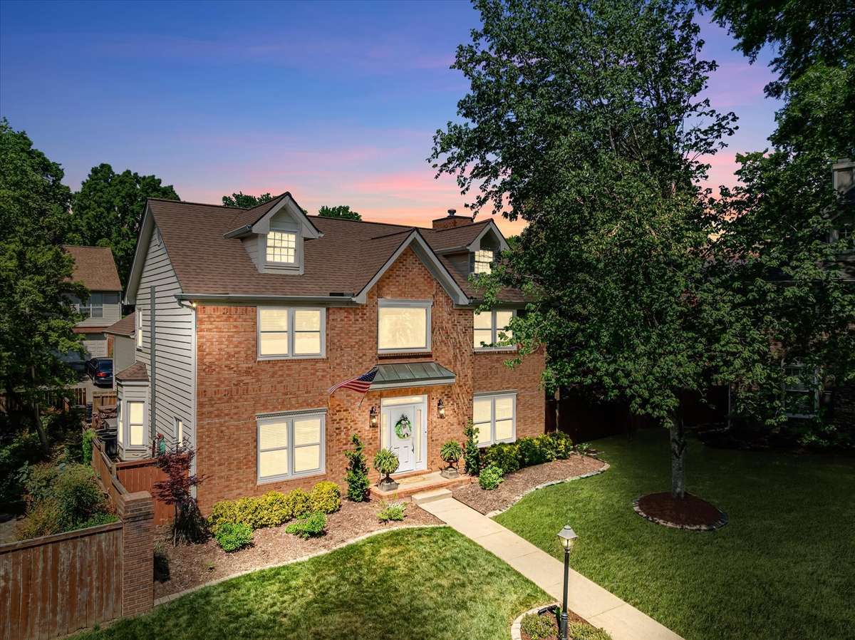 Rendered sunset—but let’s be honest, this home doesn’t need the assist. It shines at night too, especially when the pergola twinkle lights steal the show.