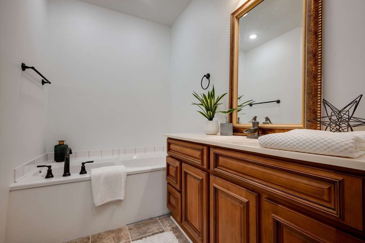 2 Full Bathrooms + 1 Powder Room/Guest Half Bath