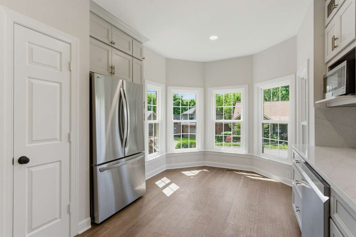 A sun-filled bay window offers an inviting setting for everyday living.