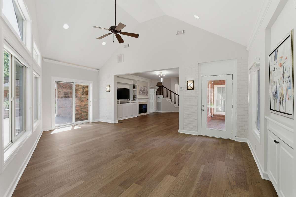 In addition, it features direct access to a spacious hardscaped outdoor living area - designed for effortless indoor-outdoor living.