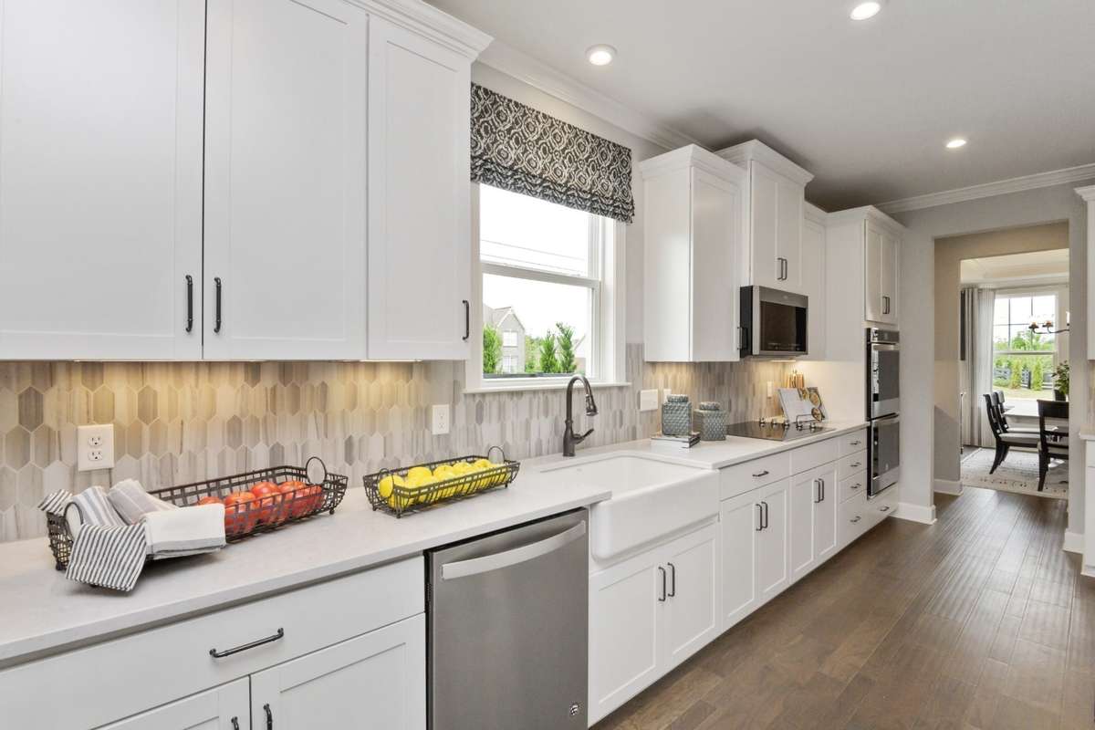 Tons of Counter space and Cabinets! Photos are of model home.
