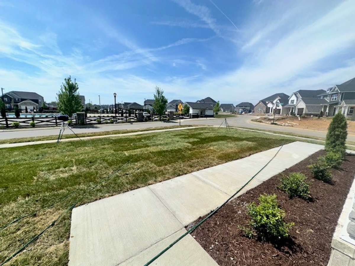 Sidewalks to the driveway!